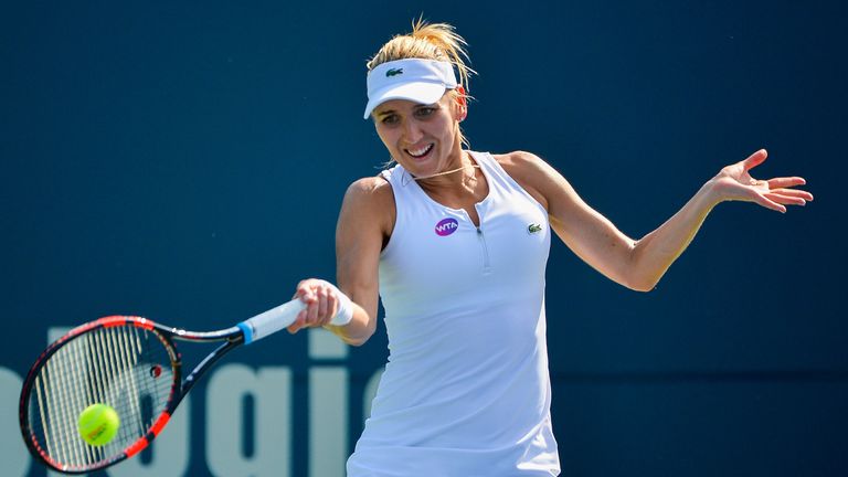 NEW HAVEN, CT - AUGUST 25:  Elena Vesnina of Russia returns a shot to Elina Svitolina of Ukraine on day 5 of the Connecticut Open at the Connecticut Tennis