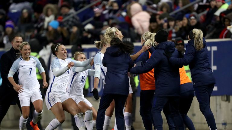 HARRISON, NJ - MARCH 04:  Ellen White #11 of England celebrates her goal with teammates on the bench in the second half against the United States during th