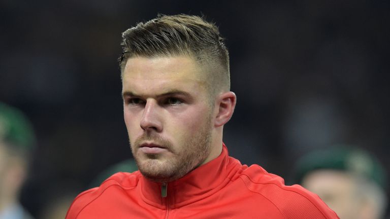 England's goalkeeper Jack Butland listens to the national anthem ahead the friendly football match Germany v England at the Olympic Stadium in Berlin on Ma