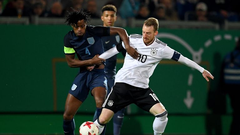 Nathaniel Chalobah challenges Maximilian Arnold during the U21 international friendly match between Germany and England at BRITA-Arena, Wiesbaden