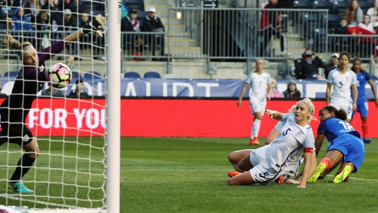 France's Marie-Laure Delie watches her ball score, tying the match, as England and France women's national teams play in the SheBelieves Cup in Chester, PA
