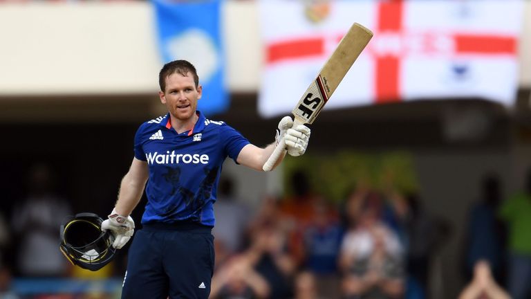 England's cricket team captain Eoin Morgan celebrates after scoring his century during the One Day International match between England and West Indies at t