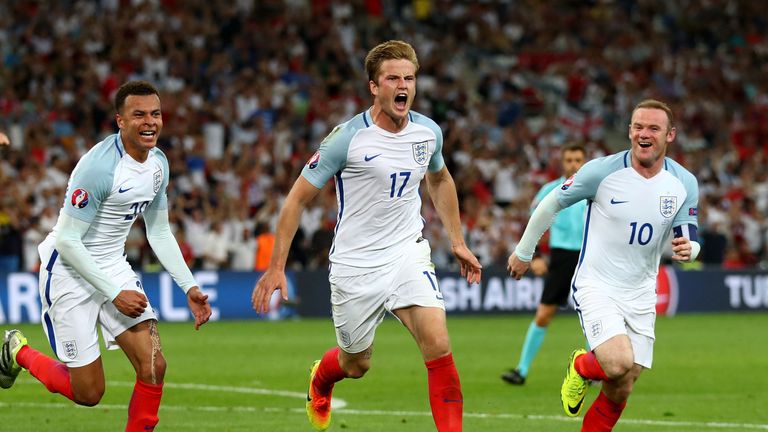 MARSEILLE, FRANCE - JUNE 11:  Eric Dier (C) of England celebrates scoring his team's first goal with his team mates Dele Alli (L) and Wayne Rooney (R) duri