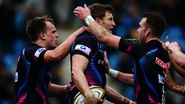 Exeter celebrate Lachie Turner's try which opened the scoring