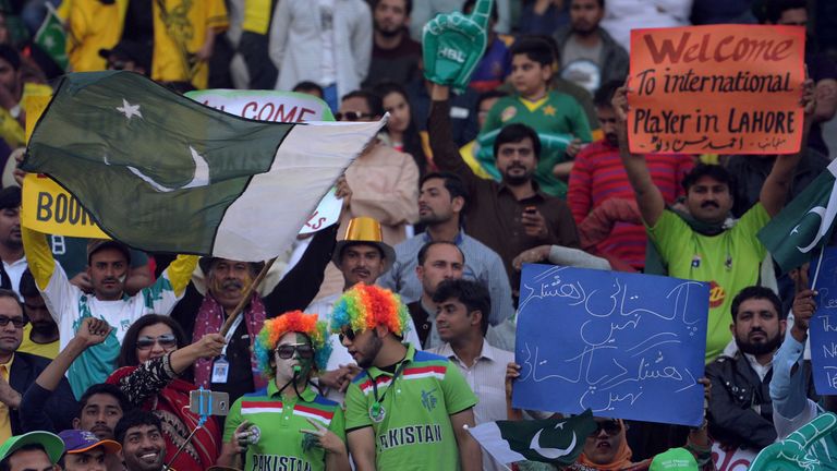 Pakistani spectators cheer prior to the start of the final of the Pakistan Super League (PSL) between Quetta Gladiators and Peshawar Zalmi