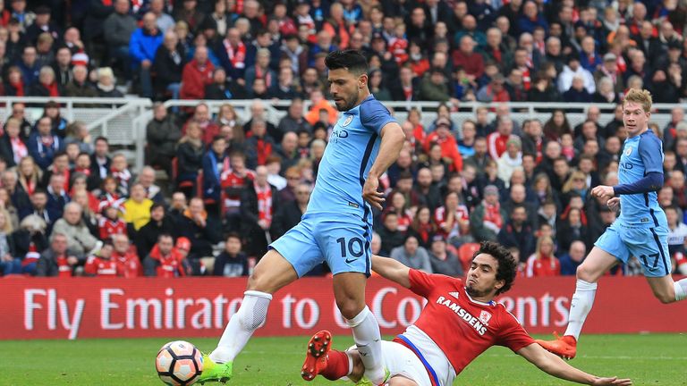 Manchester City striker Sergio Aguero (L) fired in their second