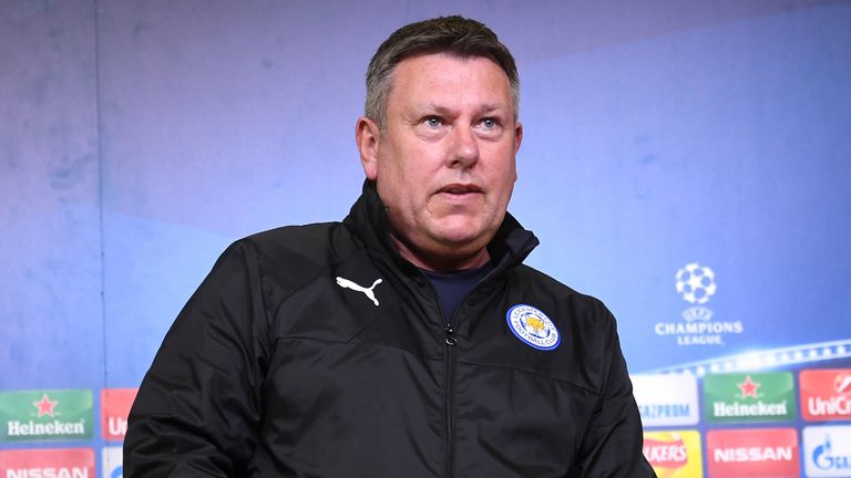 Craig Shakespeare, Manager of Leicester City enters a press conference ahead of their UEFA Champions League Round of 16 match v Sevilla