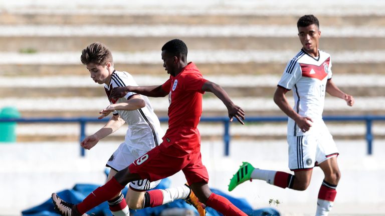 Joshua Bohui challenges Davide-Jerome Itter in a match between England U17 and Germany U17 in February, 2016