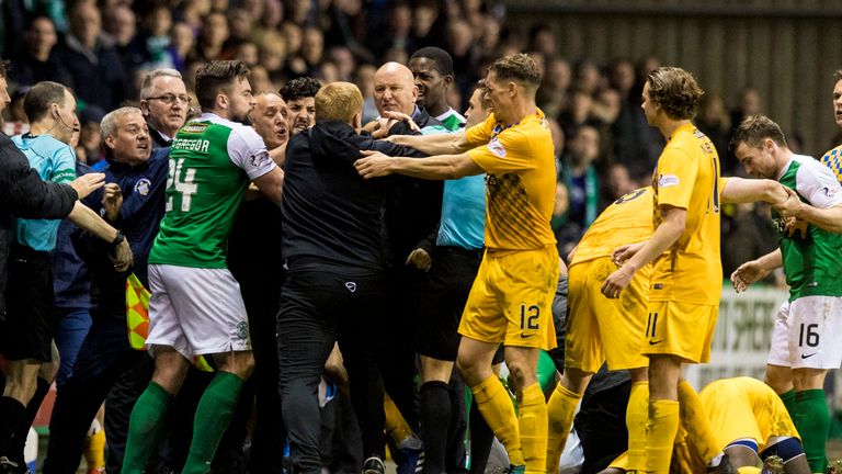 Morton manager Jim Duffy and Hibernian manager Neil Lennon are involved in a confrontation before full-time.