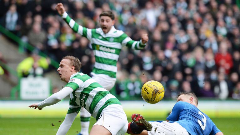 Leigh Griffiths is brought down in the box by Clint Hill during the Scottish Premiership match between Celtic and Rangers