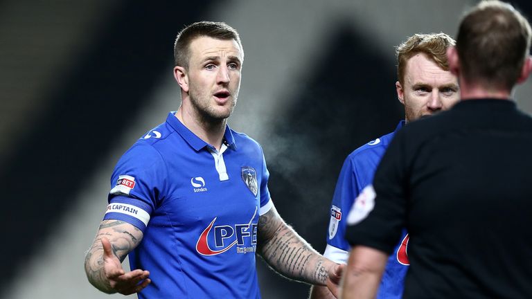 Peter Clarke: Signs new Oldham deal