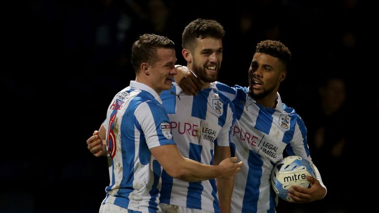 Huddersfield Town's Tommy Smith (centre) is congratulated after scoring what turned out to be the winner against Huddersfield