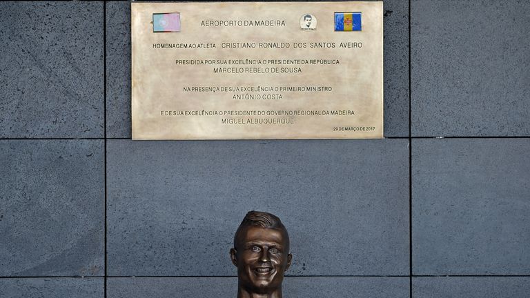 The statue of Cristiano Ronaldo is unveiled at the ceremony at Madeira Airport