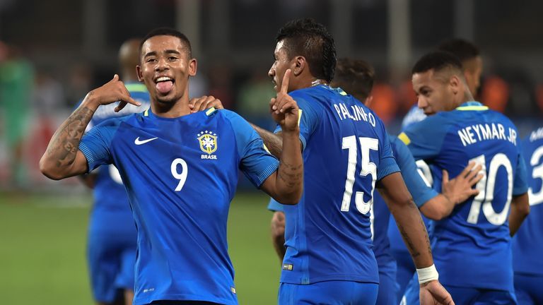 Brazil's Gabriel Jesus (L) celebrates after scoring against Peru during their 2018 FIFA World Cup qualifier football match in Lima, on November 15, 2016. /