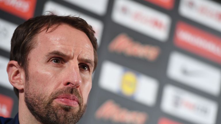 England manager Gareth Southgate faces the media