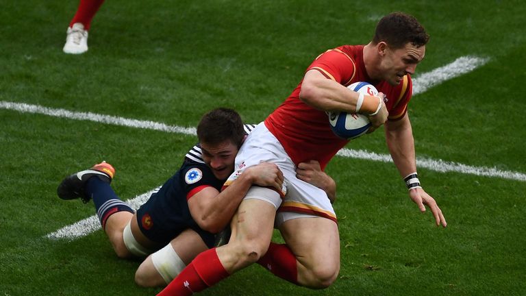 George North is tackled by Brice Dulin