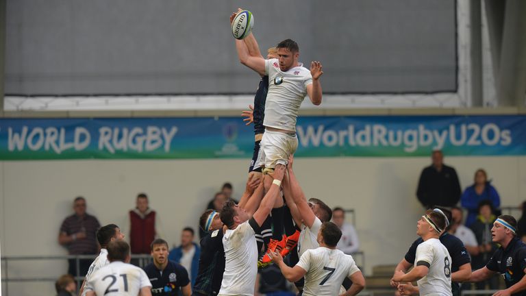 MANCHESTER, ENGLAND - JUNE 11: George Nott of Englandknocks the ball back in the line out during the World Rugby U20 Championship match between  England an