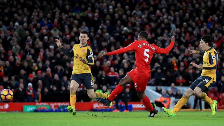 Liverpool's Georginio Wijnaldum scores his side's third goal of the game during the Premier League match at Anfield, Liverpool.