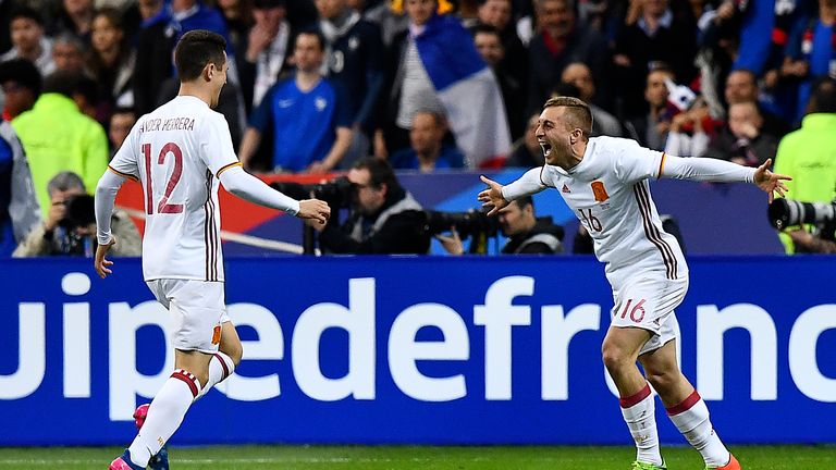 Spain's midfielder Gerard Deulofeu celebrates after scoring Spain's second goal against France