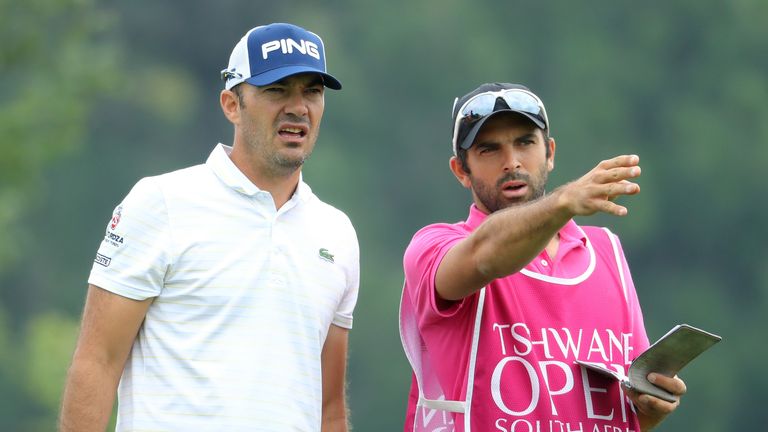 PRETORIA, SOUTH AFRICA - MARCH 02: Gregory Havret of France speaks with his caddie on the 12th during Day One of The Tshwane Open at Pretoria Country Club 