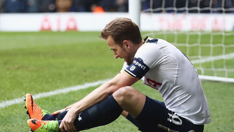 LONDON, ENGLAND - MARCH 12: Harry Kane of Tottenham Hotspur holds his ankle during The Emirates FA Cup Quarter-Final match between Tottenham Hotspur and Mi