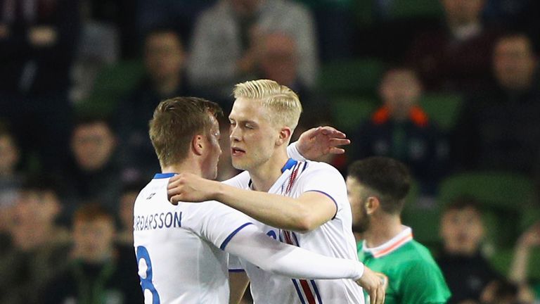 Icelnad's Hordur Magnusson (R) celebrates scoring the opening goal against Republic of Ireland