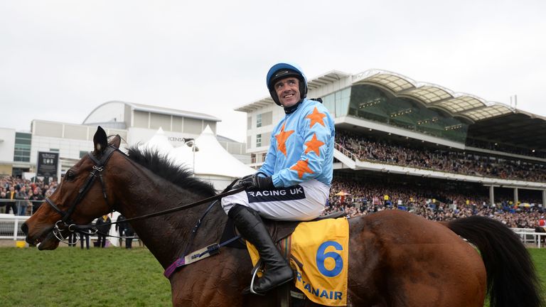 Ruby Walsh celebrates on Un De Sceaux after winning the Ryanair Steeple Chase during St Patrick's Thursday at Cheltenham