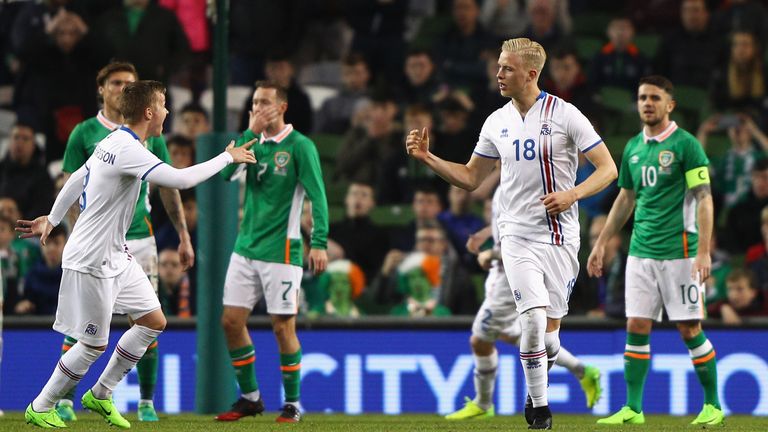 DUBLIN, IRELAND - MARCH 28:  Hordur Magnusson (R) of Iceland celebrates scoring the opening goal with Aron Sigurdarson of Iceland during the International 