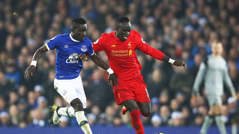 Sadio Mane holds off Idrissa Gueye during the Premier League match between Everton and Liverpool at Goodison Park