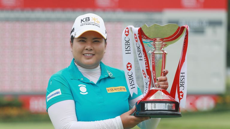 SINGAPORE - MARCH 05:  Inbee Park of South Korea celebrates with the trophy after winning the HSBC Women's Champions on the Tanjong Course at Sentosa Golf 
