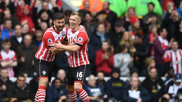 James Ward-Prowse celebrates with Shane Long after pulling a goal back for Southampton at White Hart Lane