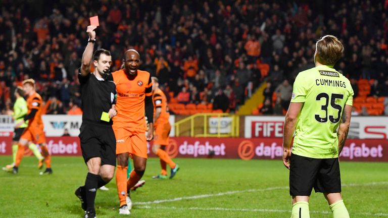 Hibernian's Jason Cummings is sent off following a second booking against Dundee United