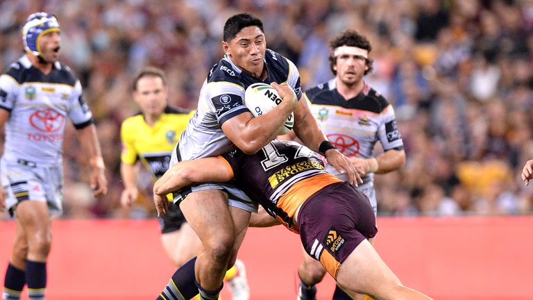 BRISBANE, AUSTRALIA - MARCH 10:  Jason Taumalolo of the Cowboys takes on the defence during the round two NRL match between the Brisbane Broncos and the No
