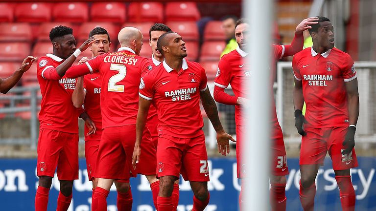 Leyton Orient Jay Simpson with his team-mates after scoring his sides first goal during the Sky Bet League Two