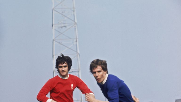 Liverpool defender Larry Lloyd (left) and Everton centre-forward Joe Royle in action during an FA Cup semi-final match against Everton at Old Trafford, Man