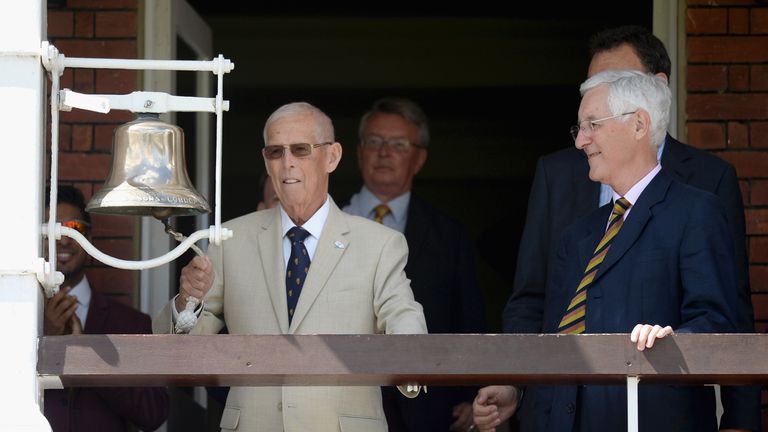 John Hampshire, seen here ringing the five-minute bell ahead of day three of the first Test between England and Pakistan at Lord's in July 2016, has died