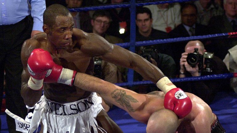 Johnny Nelson (L) from Sheffield, the defending WBO Cruiserweight boxing Champion, in action against Pietro Aurino, from Italy, at York Hall, Bethnal Green