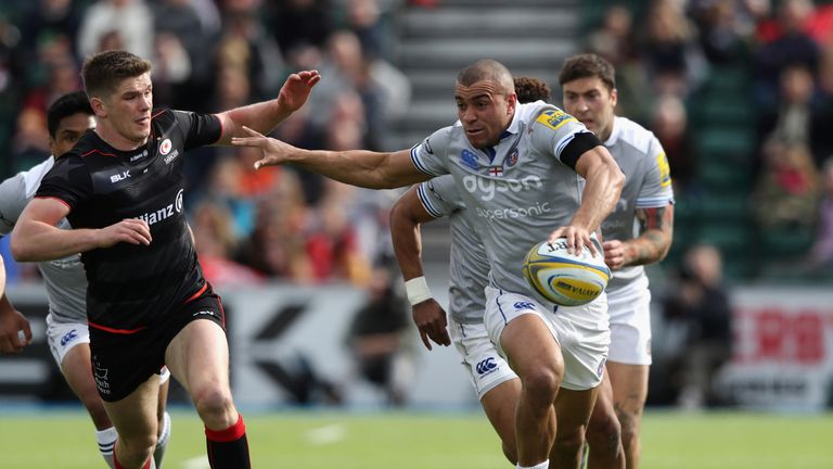 Jonathan Joseph  breaks away from Owen Farrell