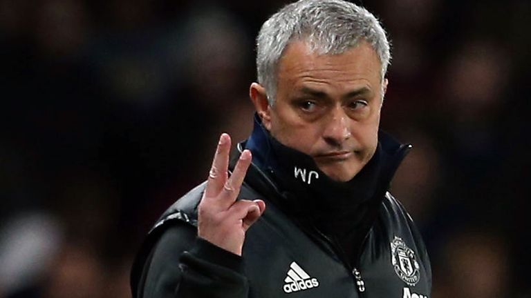 Jose Mourinho holds up three fingers during the Emirates FA Cup Quarter-Final match between Chelsea and Manchester United at Stamford Bridge
