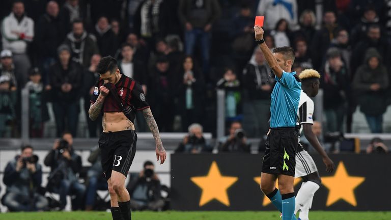 TURIN, ITALY - MARCH 10:  Jose Sosa of AC Milan receives red card from referee Davide Massa during the Serie A match between Juventus FC and AC Milan at Ju