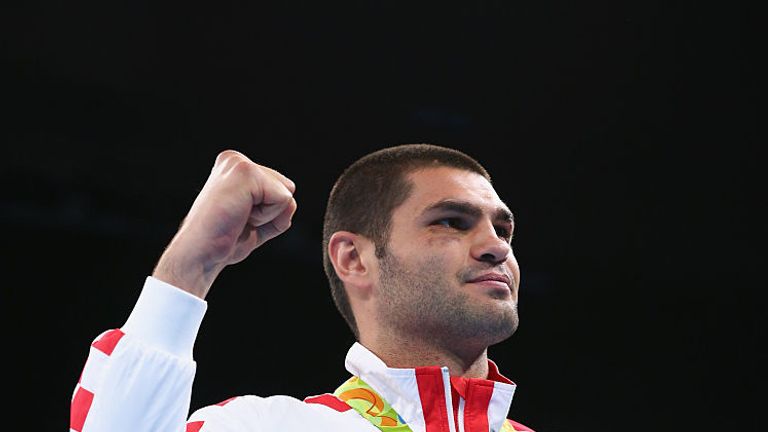 Bronze medalist Filip Hrgovic of Croatia poses on the podium during the medal ceremony for the Men's Boxing Super Heavyweight's.