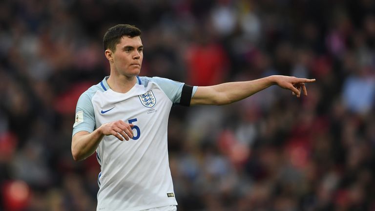 LONDON, ENGLAND - MARCH 26: Michael Keane of England gestures to his team mates during the FIFA 2018 World Cup Qualifier between England and Lithuania at W