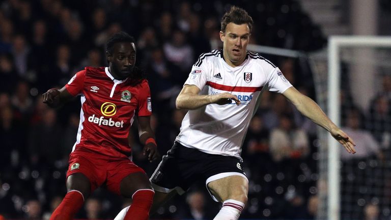 Fulham's Kevin McDonald (right) takes the ball away from Blackburn Rovers' Marvin Emnes (left) during the Sky Bet Championship match at Craven Cottage, Lon