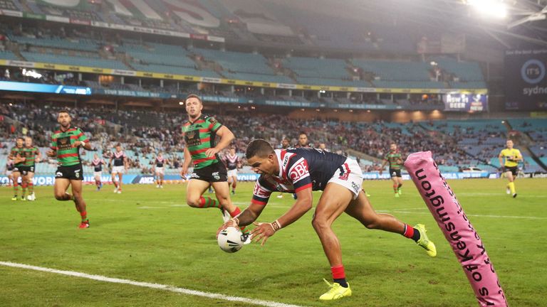 SYDNEY - MARCH 23 2017:  Latrell Mitchell of the Roosters scores a try during the NRL match between the South Sydney Rabbitohs and the Sydney Roosters
