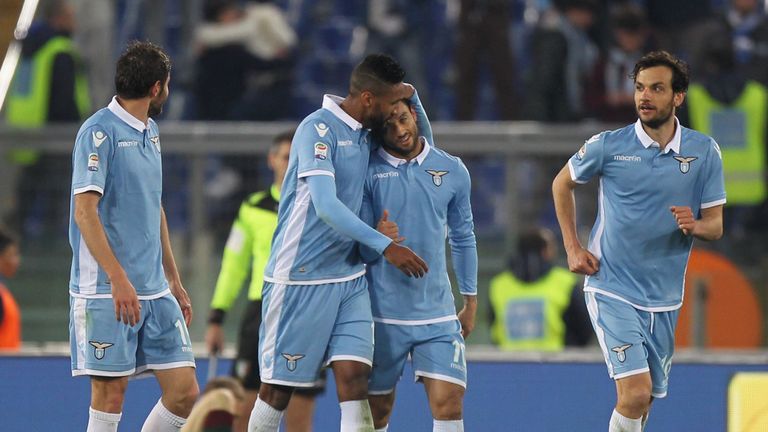 ROME, ITALY - MARCH 13:  Felipe Anderson (C) with his teammates of SS Lazio celebrates after scoring the team's third goal during the Serie A match between