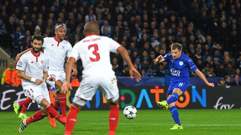 LEICESTER, ENGLAND - MARCH 14:  Marc Albrighton of Leicester City scores his team's second goal during the UEFA Champions League Round of 16, second leg ma