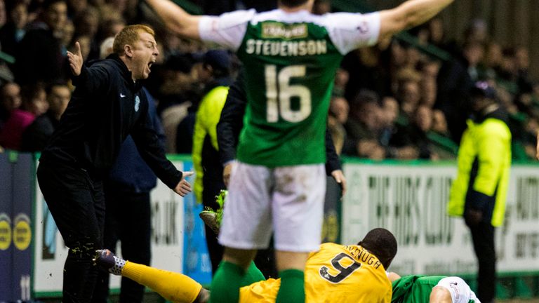 Hibernian manager Neil Lennon (L) vents his fury as Hibernian's Jordon Forster (R) lies injured after a tackle by Morton's Kudus Oyenuga (centre).