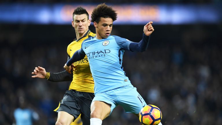 Leroy Sane shoots on goal to equalise for Manchester City during the Premier League match against Arsenal