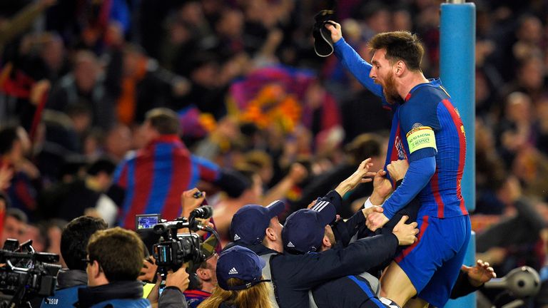 Barcelona captain Lionel Messi celebrates after sealing qualification to the Champions League quarter-finals