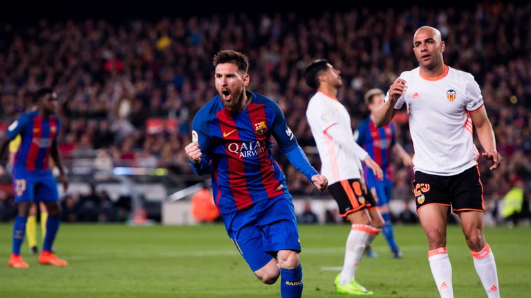 Lionel Messi of FC Barcelona celebrates after scoring his team's third goal.